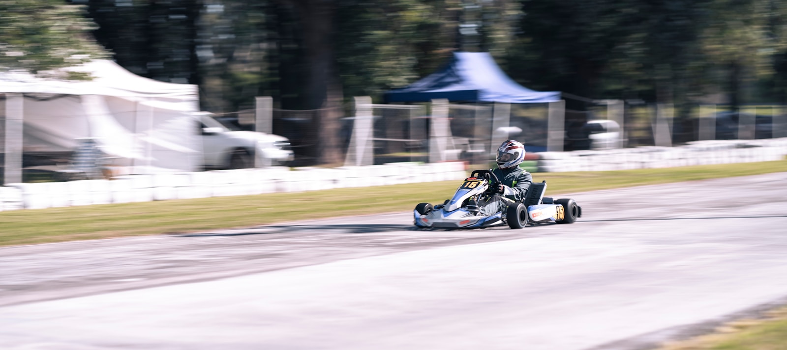 a person driving a go kart